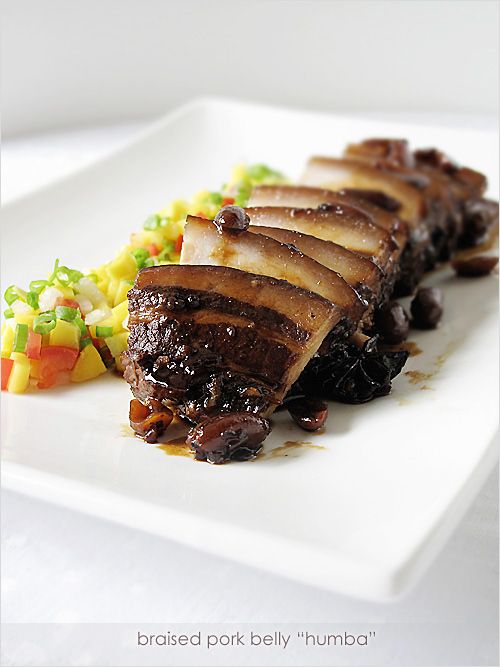 Humba is an interesting dish. This slow braised pork belly is coated in a sweet glaze of panocha or palm sugar and given depth of flavor with the addition of soy sauce, salted black beans, and star anise. | rasamalaysia.com