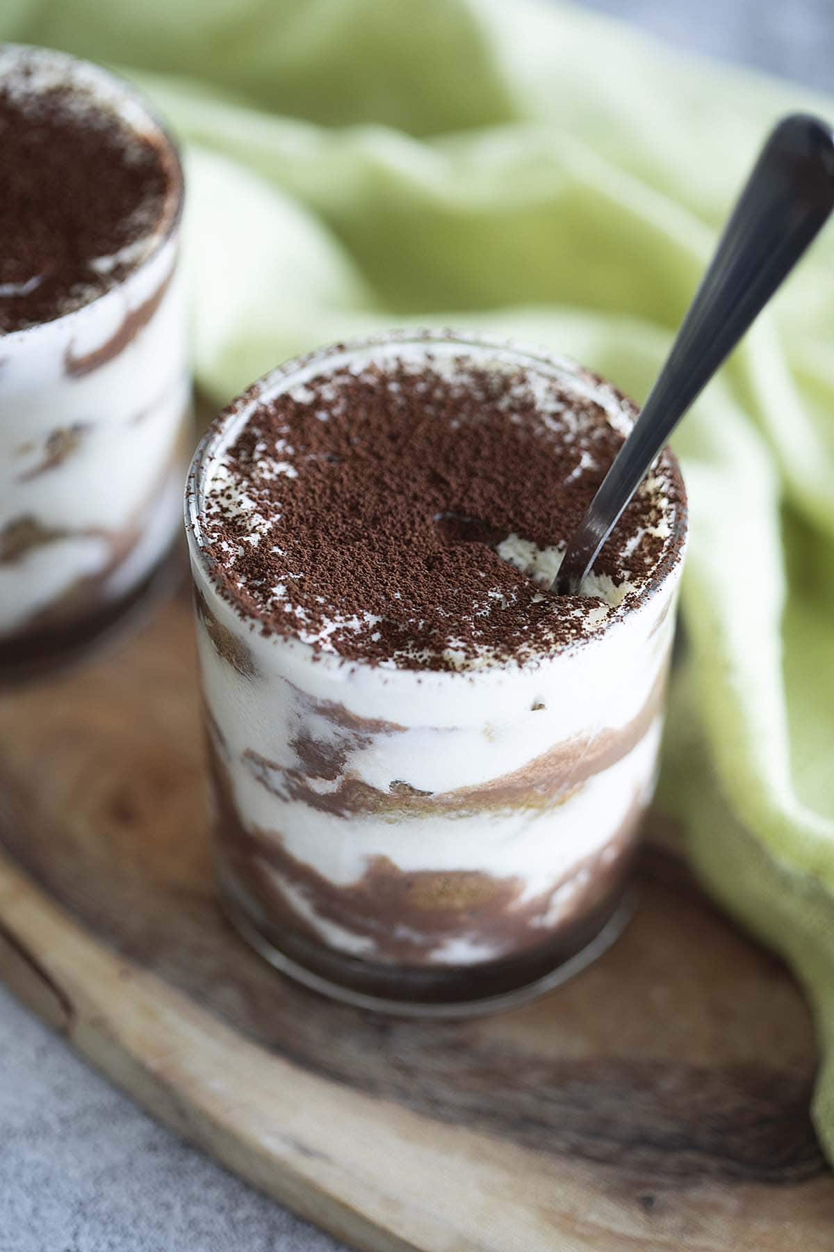 Eggless Tiramisu dessert, beautifully presented and ready to be enjoyed, featuring layers of creamy goodness and coffee-soaked ladyfingers.