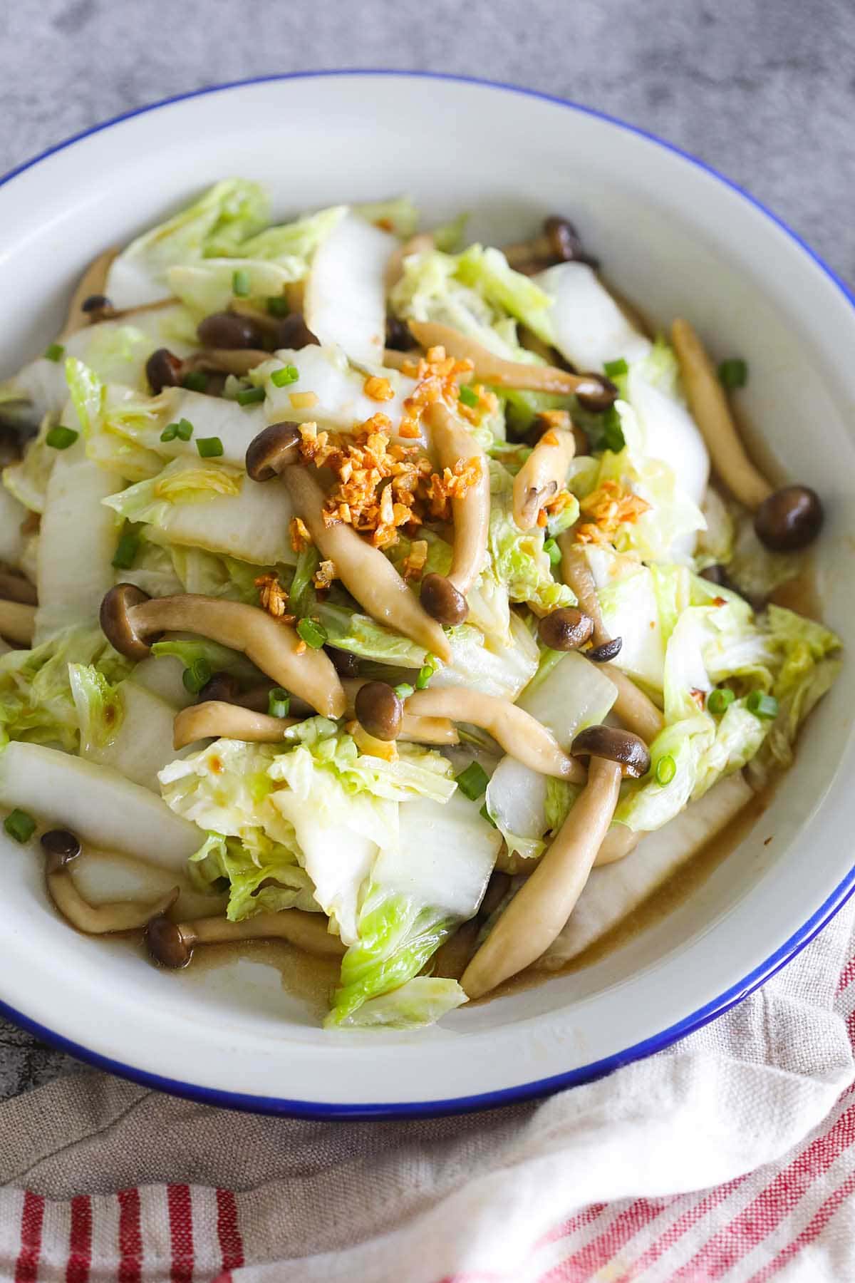One bowl of Napa cabbage stir fry with mushroom.