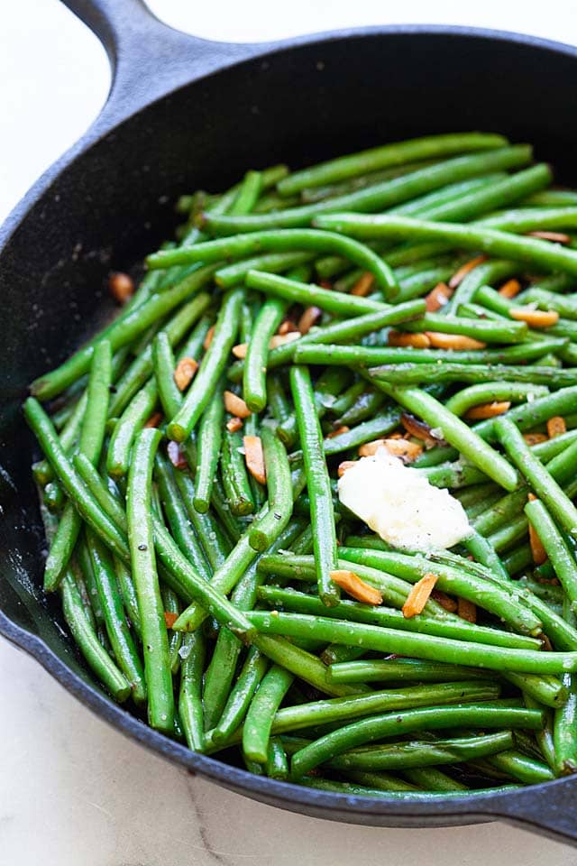Green bean recipe sauteed on a skillet with brown butter.