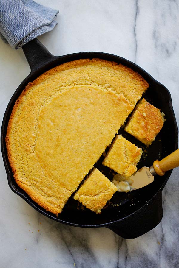 Easy cast-iron skillet corn bread bake in oven and served with whipped honey butter.