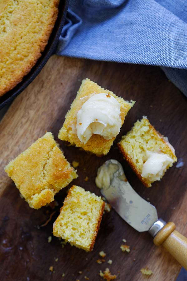 Easy and delicious corn bread sliced in cubes sizes and spread with honey butter.